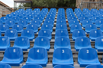 Identical blue seats at the stadium
