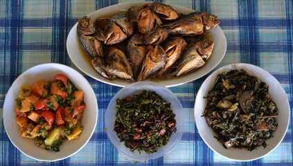 Assorted dishes on a checkered tablecloth