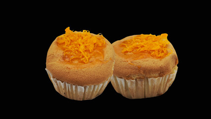 tasty muffin cake Foi Thong topping on white black background. 