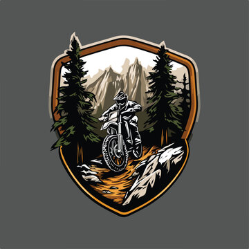 Bold badge-style logo of a white man riding a motor trail across rocky terrain with pine forest and mountain backdrop. Rugged black-white-yellow vector with dirtbike, motocross, and enduro energy.