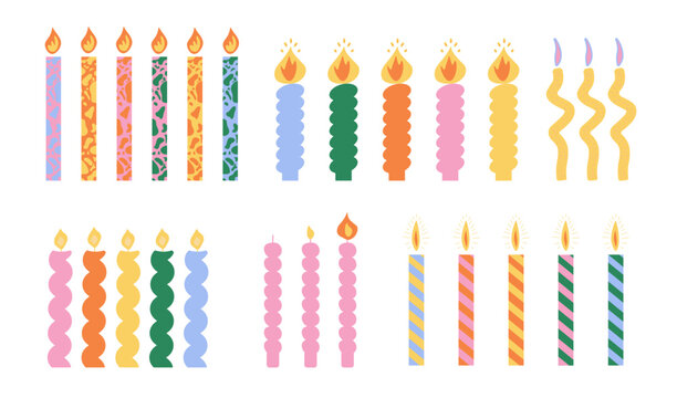 Set of colorful decorative birthday candles with various patterns isolated