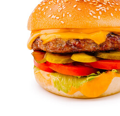 Delicious cheeseburger with fresh ingredients and sesame seed bun