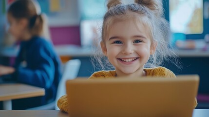 Happy Young Girl Engaged in Learning with a Laptop in Classroom