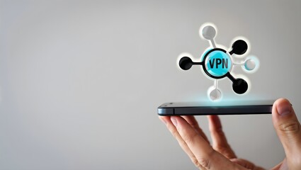 Hand holding smartphone with glowing vpn network icon floating above