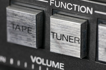 Function selector square buttons for audio system