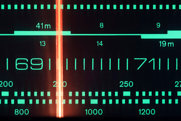 The scale and tuning indicator, fragment of an old analog radio receiver