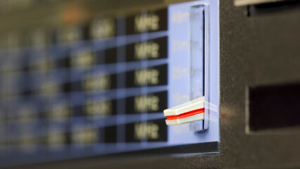 The wavelength selector switch of an old analog radio set