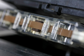 View of the compact cassette inserted in the tape recorder