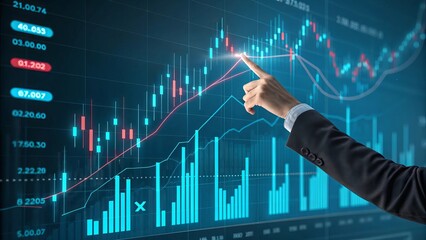Businessman pointing at upward trending financial stock market graph