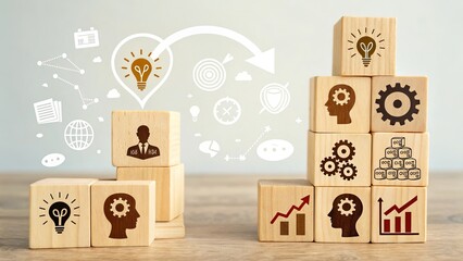 Wooden blocks with business icons and growth progression