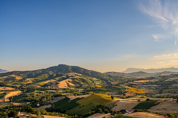 The Marche, a region of eastern Italy, rises between the Apennine mountains and the Adriatic Sea.