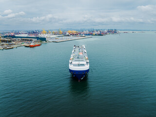 Roll on Roll of  ship loading new cars  carriers floating in sea, business services import export...