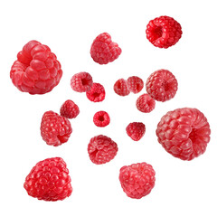 Fresh raspberries swirling in air against white background