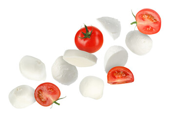 Mozzarella cheese and tomatoes flying against white background