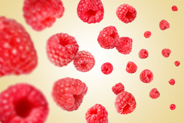 Fresh raspberries swirling in air against beige background