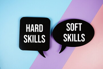 Hard skills vs Soft skills text on speech bubble top view on blue, purple and pink geometric...