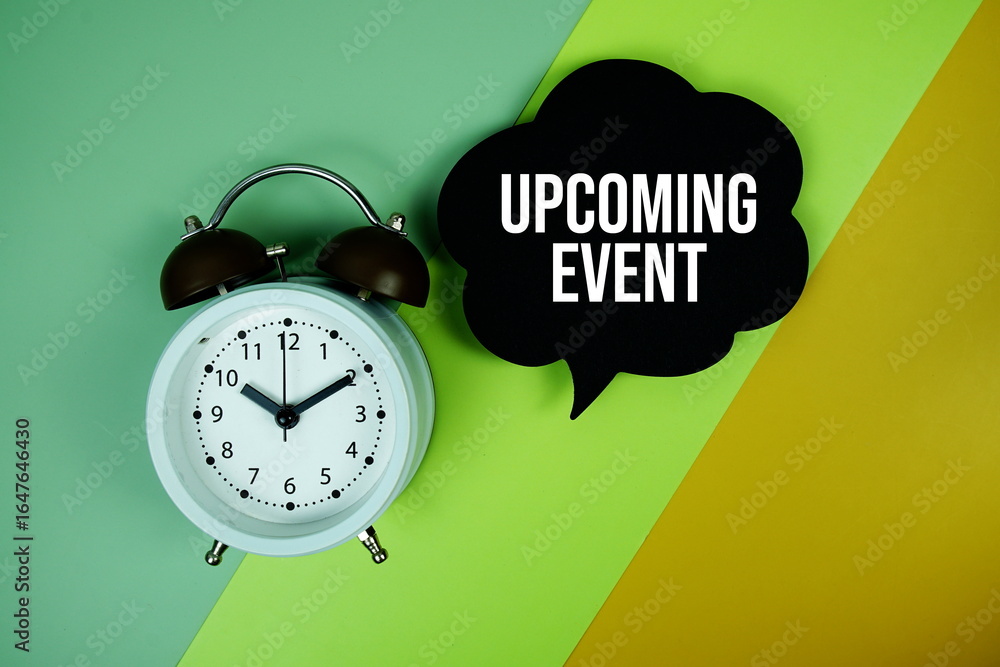 Poster upcoming events text on speech bubble with alarm clock top view on green and yellow geometric backgr