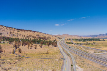 Aerial view of traffic at the Intersection of I-580 and Highway US 395 and Washoe Lake State Park in Washoe Valley  located between Reno and Carson City Nevada.