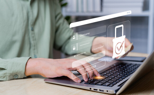 Businessman securing data on laptop with encryption, network protection, secure login, and digital privacy to safeguard business secrets and ensure safe internet access.