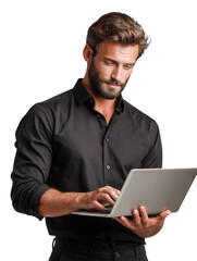 A man wearing a black shirt is typing on a laptop