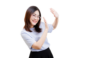 A smiling Asian young beautiful woman in a casual outfit gestures with her hands, expressing...