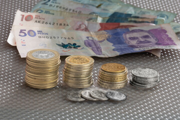 Colombian banknotes and coins of different denominations, Colombia,