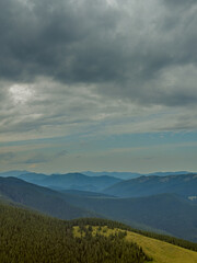 Fototapeta premium A somber Carpathian landscape, majestic and timeless under cloudy skies.