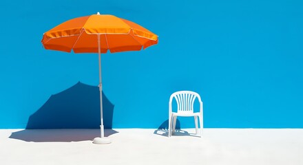 Bright orange umbrella with white chair
