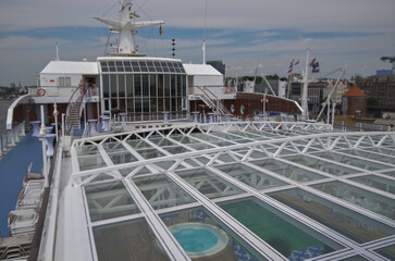 Outdoor private sun deck onboard modern luxury cruiseship cruise ship liner with elegant sun...