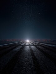 dark concrete or asphalt of plane runway with light in the night sky view