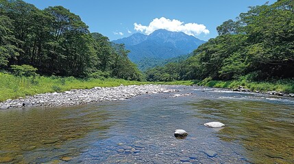 Clear river flows through lush valley, mountain backdrop