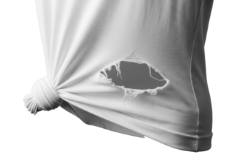 White cotton t-shirt, knotted at lower-left, featuring a distinct, stretched, frayed hole, isolated on a transparent background with soft studio lighting. Concept of fabric manipulation and texture