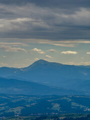 Sunny Carpathian peaks: green valleys and crystal clear skies.