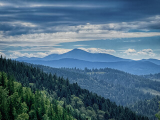 Sunny Carpathian peaks: green valleys and crystal clear skies.