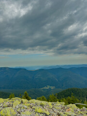 Sunny Carpathian peaks: green valleys and crystal clear skies.