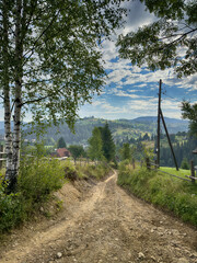 Sunny Carpathian peaks: green valleys and crystal clear skies.