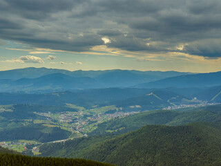 Sunny Carpathian peaks: green valleys and crystal clear skies.