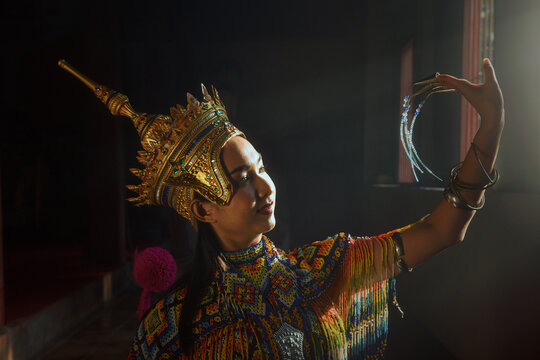 Portrait of a woman performing a classical Thon dance, Thailand