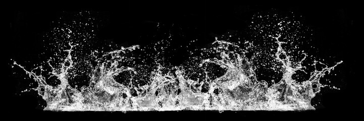 Water Splash Crown: Capturing a moment of dynamic energy, a crown-shaped water splash shimmers...