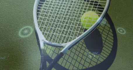 White tennis racket with yellow ball lying on green court, featuring digital overlay graphics
