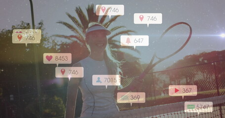 Holding racket, wearing visor, tennis player standing by net on court, social media icons floating