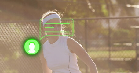 Standing player wearing white top, headband on court by chainlink fence with green digital overlay