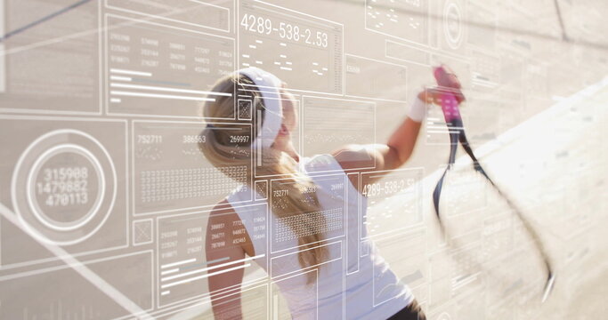 Tennis player with headband hitting forehand shot at practice wall, with racket and data overlays