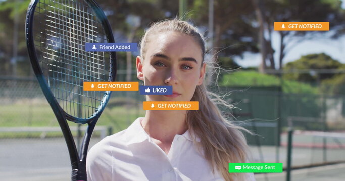 Holding racket, female in white polo standing on tennis court by net, with social media overlays