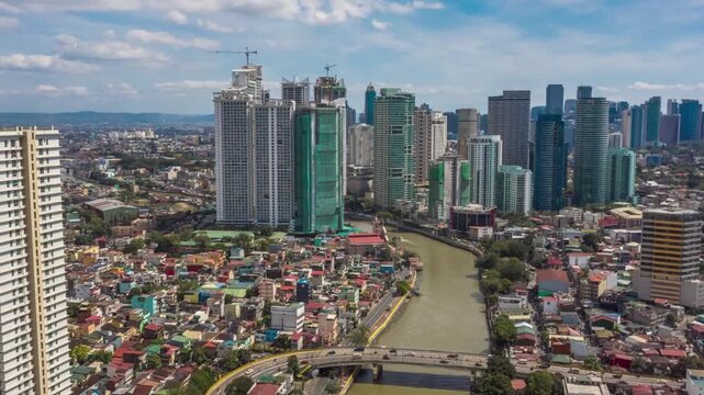 Aerial view of the manila skyline with skyscrapers and pasig river, philippines