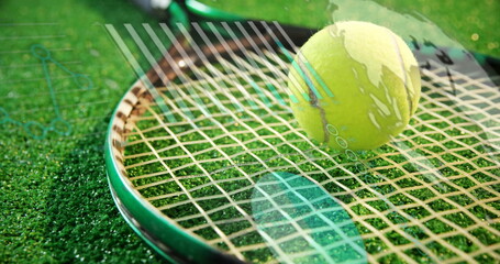 Lying tennis racket with taut strings on grass court, with yellow ball and digital overlay graphics