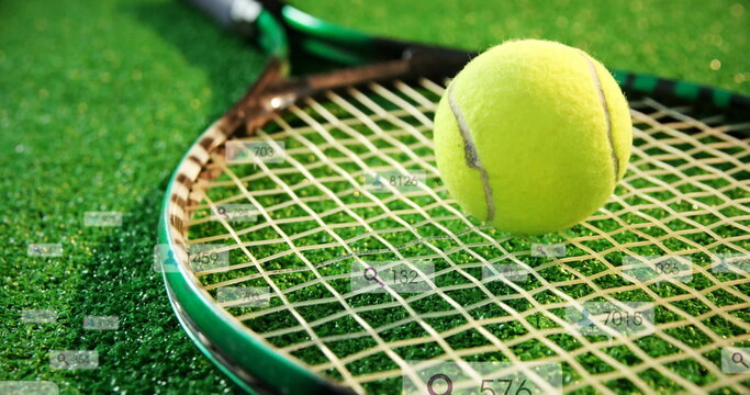 Fototapeta Highlighting tennis racket and ball lying on synthetic grass court, with digital overlay elements