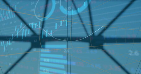 Dark metal frame crossing trading dashboard, with candlestick bars line graph and numeric readouts