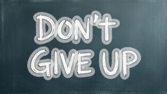 A motivational message on a blackboard encouraging people not to lose hope