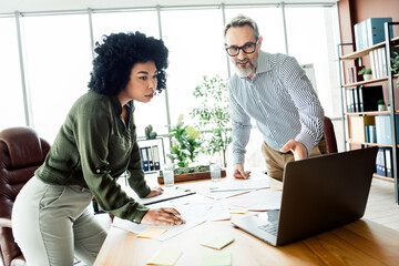 Professional team collaborating in a modern office on a business project for innovative strategy...